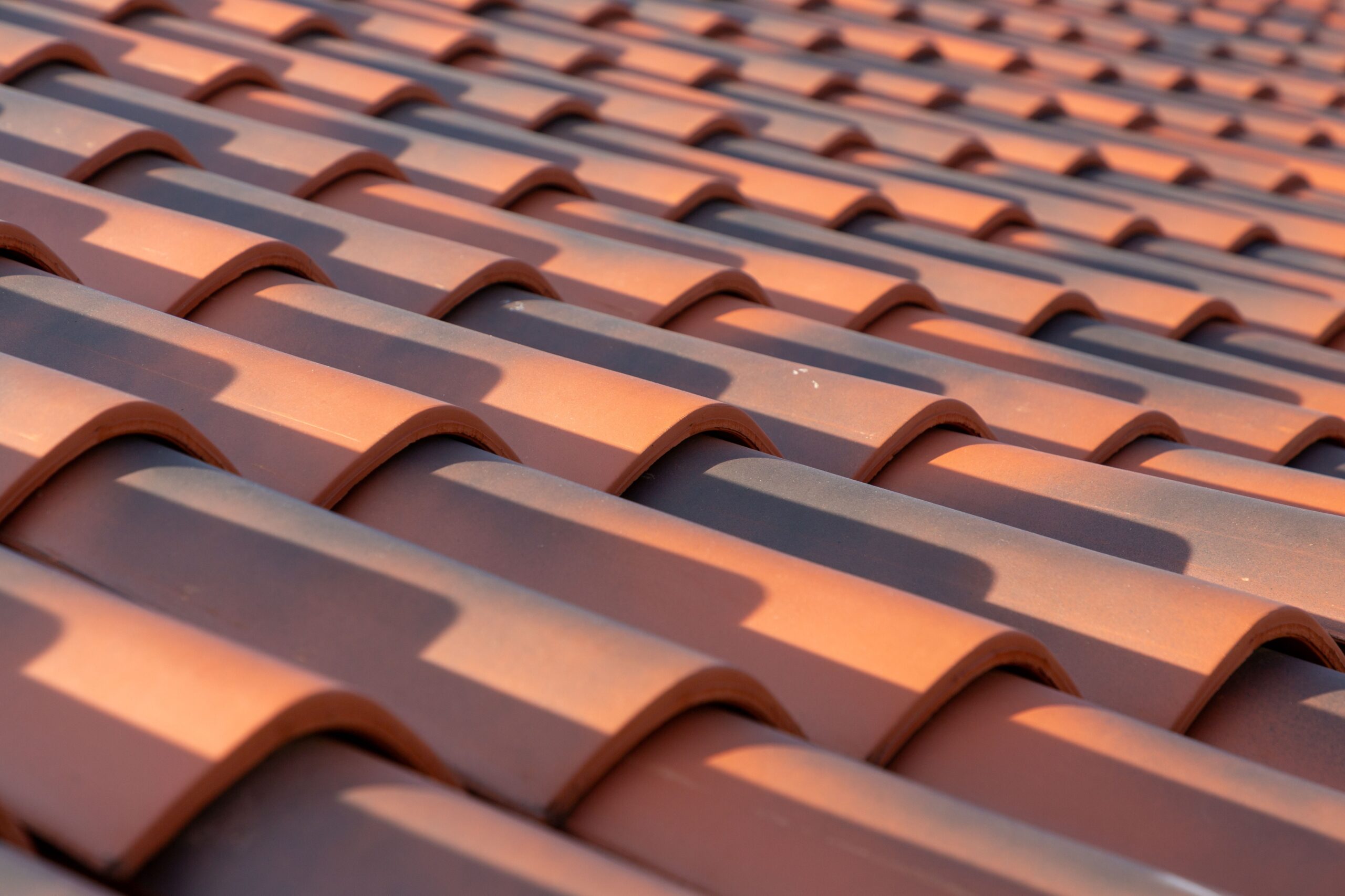 Orange,Colored,Classic,Corrugated,Roof,Tiles,,Shingles,,Close,Up,Texture Shutterstock 2478000437 Scaled | Roofing